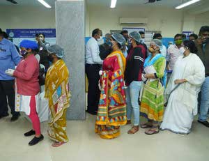 Mamata Banerjee Queue Swastha Sathi card 