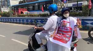 mamata on scooter স্কুটারে মমতা