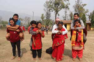 Nepal woman run with their husband স্বামীদের কাধে নিয়ে মহিলাদের দৌড়